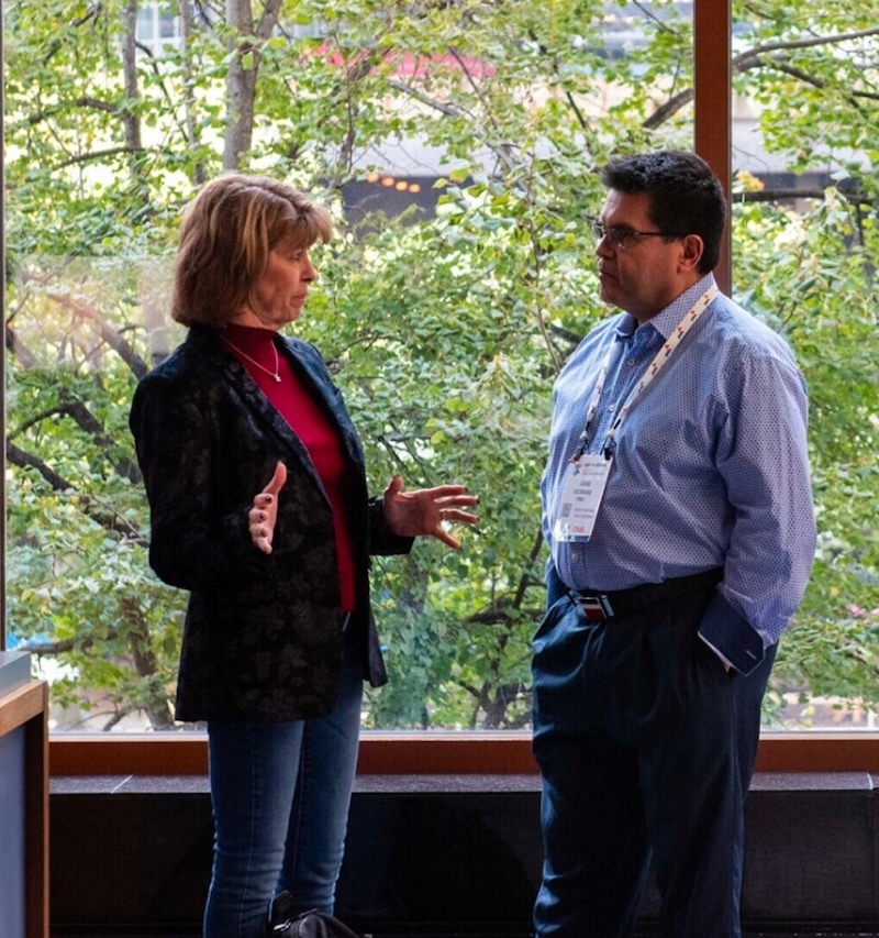 Two people talking at an event_Hero_113943